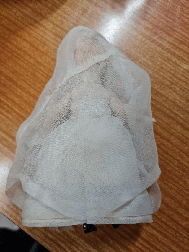 Poupee communiante porcelaine